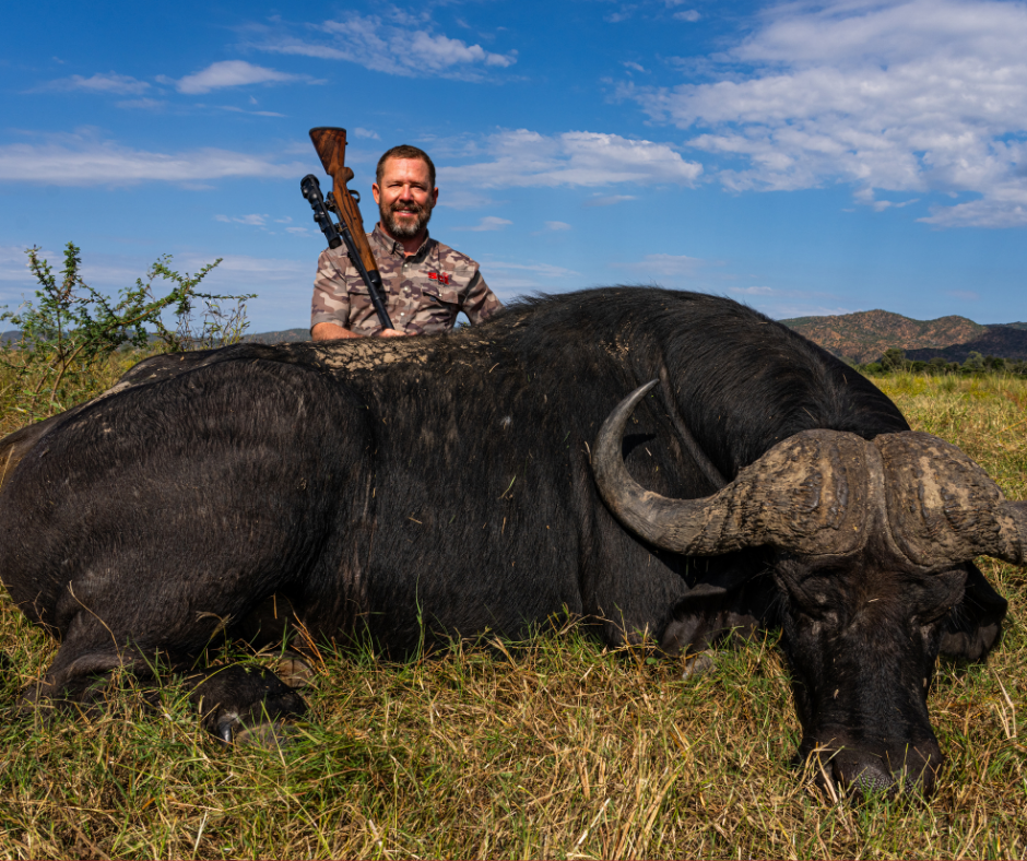 Robert Beall with a Cape buffalo