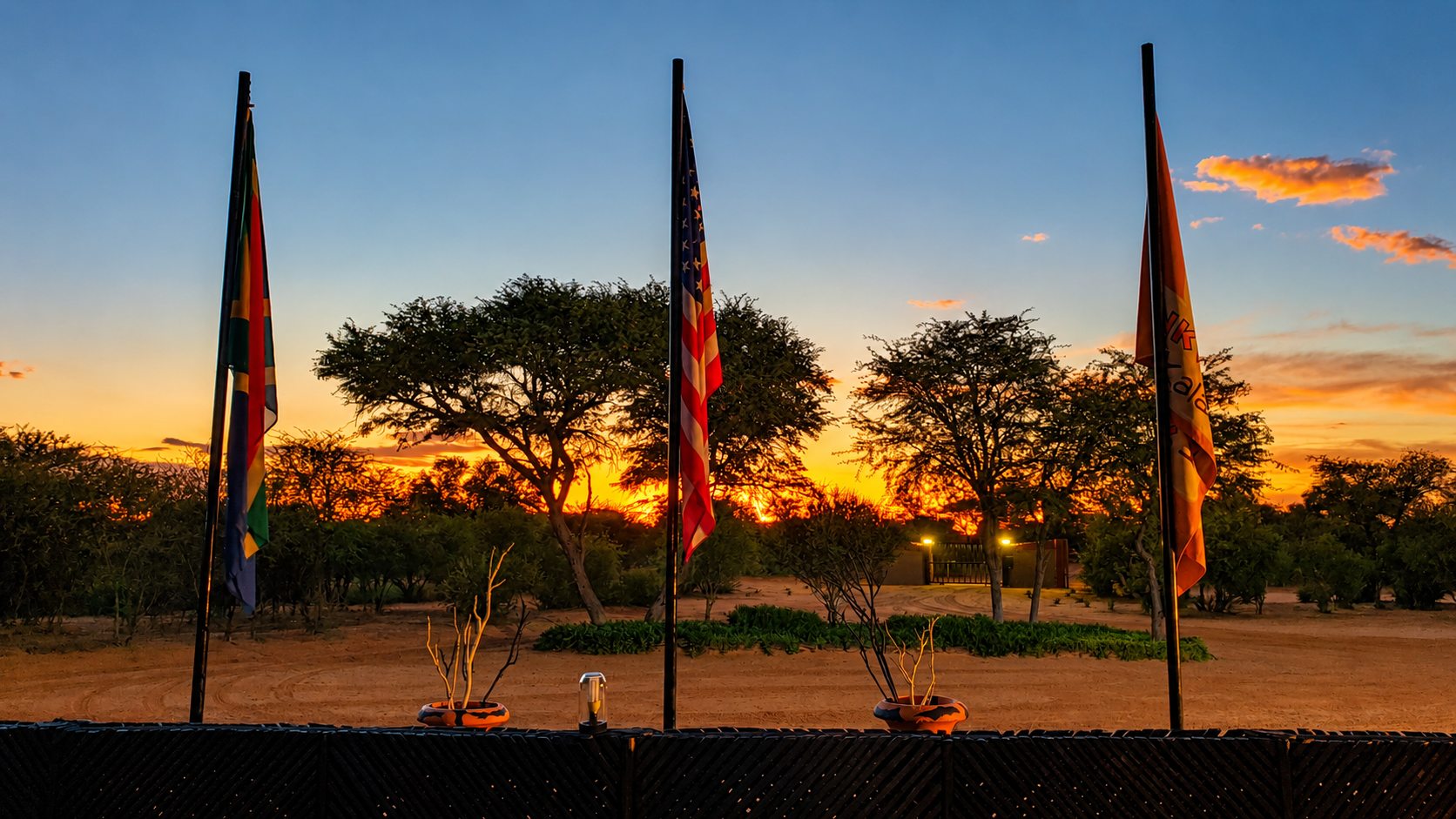 Lodge terrace flags at sunset